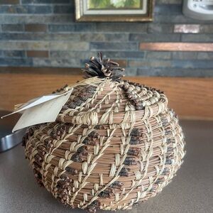 Tan and Brown Woven Basket with Spiral Weaving Pattern. Artist signed
